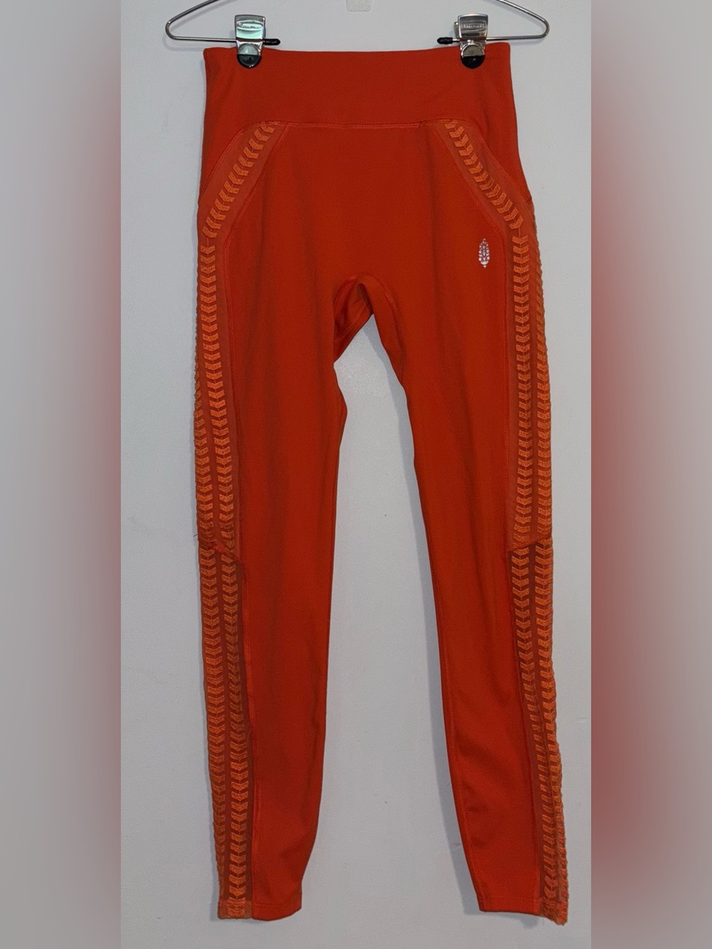 Free People Movement Desert Renegade Leggings in mandarin red. Size Small